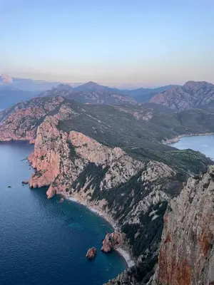 an aerial view of a rocky island in the water at T2 neuf situation Topissime village de Cargèse Vue mer Toutes commodités in Cargèse