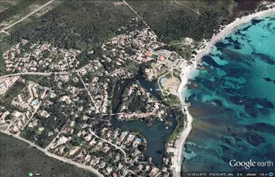 an aerial map of a city next to the water at A-Tjughina in San Ciprianu