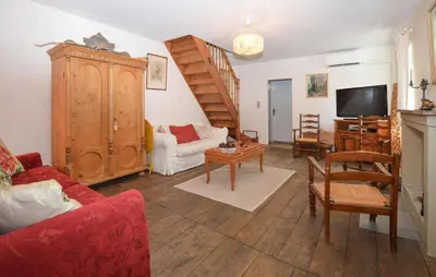 a living room with a couch and a tv at Stunning Apartment In Ciamannacce in Ciamannacce