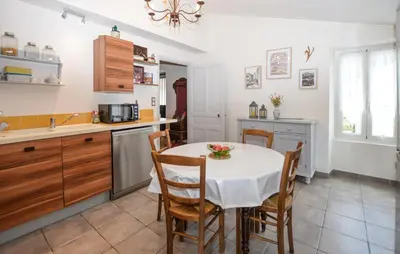 a kitchen and dining room with a table and chairs at Stunning Apartment In Ciamannacce in Ciamannacce