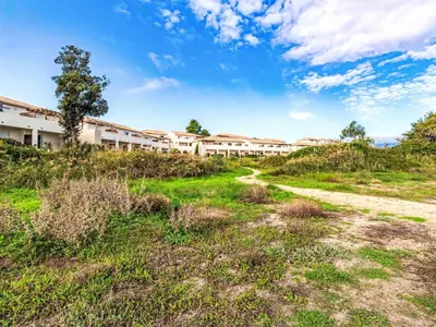 a dirt road in front of a building at Apartment Mido by Interhome in Linguizzetta