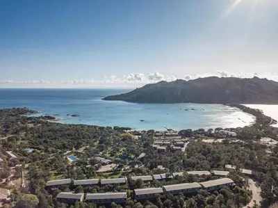 an aerial view of a city and the ocean at Appartement 4* piscine et plage à pied in Porto-Vecchio