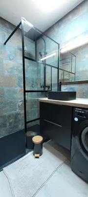 a bathroom with a sink and a washing machine at Doalchaléda in Linguizzetta