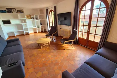 a living room with a couch and chairs and a table at T4 Furesta - Casa Mattea in Aléria
