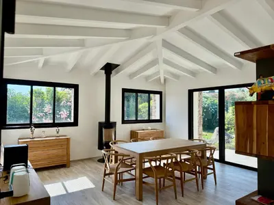 a dining room with a table and chairs at Villa à Marina di Fiori - 8 pers in Porto-Vecchio