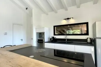 a kitchen with a sink and a counter top at Villa à Marina di Fiori - 8 pers in Porto-Vecchio
