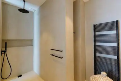a bathroom with a shower and a shower at Villa Wooden Horizon - Mer Montagne 18 pers in Porto-Vecchio