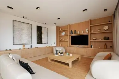 a living room with a couch and a coffee table at Villa Wooden Horizon - Mer Montagne 18 pers in Porto-Vecchio