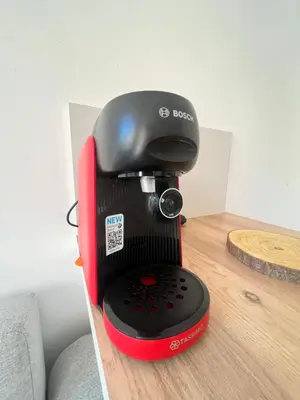 a black and red mixer sitting on a table at LE FINOSELLO - T2 Cosy sur Ajaccio avec Clim, Wifi & Parking - proche Port & Aéroport in Ajaccio
