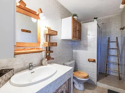 a bathroom with a sink and a toilet at Apartment T1 Gabriello by Interhome in Cala dʼOro