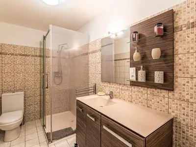 a bathroom with a sink and a shower and a toilet at Holiday Home Casa Santa Reparata by Interhome in Santa-Reparata-di-Moriani
