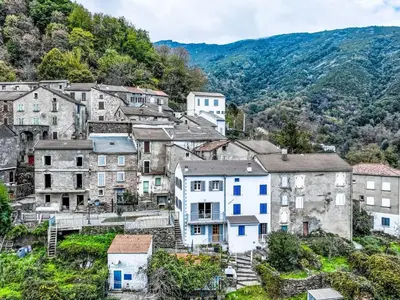 an old town in the mountains with houses at Holiday Home Casa Santa Reparata by Interhome in Santa-Reparata-di-Moriani