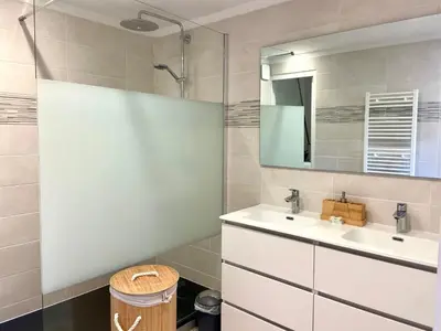 a bathroom with a sink and a mirror at Casa Chiaverini in Lecci