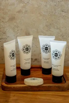 a group of four products on a wooden tray at Villa 3 chambres avec piscine privative in Porto-Vecchio