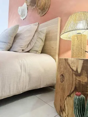 a bed with pillows and a table with a lamp at Nouveauté ! Bel'Orizonte T - Deux Chambres proche mer in Propriano