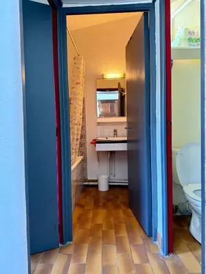 a bathroom with a toilet and a sink at Maisonnette vue mer résidence vacances Porticcio in Grosseto-Prugna