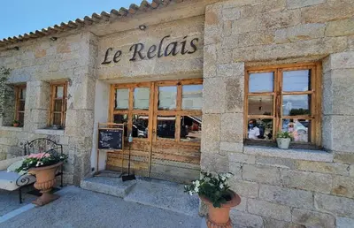 a store front of a building with a sign on it at U Caseddu in Sotta