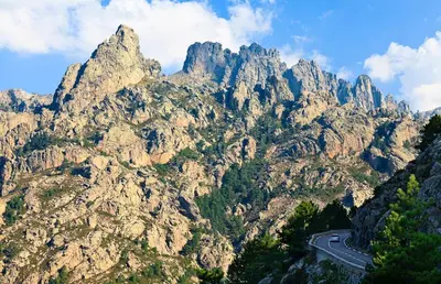 a mountain view of a road in the mountains at U Caseddu in Sotta