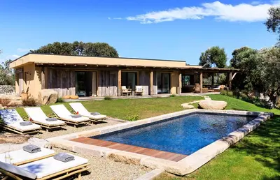 a house with a swimming pool in the yard at Villa Grazie in Bonifacio