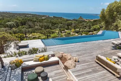 a house with a view of the ocean at Casa Rocca Di Pianotolli in Pianottoli-Caldarello