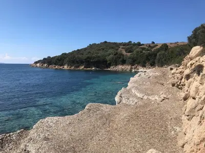 a view of the ocean from a rocky shore at Villa panoramic - Dream and Suite Lodge in Vico