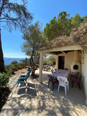 a patio with a table and chairs on a patio at Villa panoramic - Dream and Suite Lodge in Vico