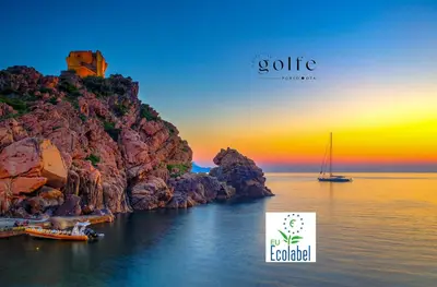 a beach with a small shack on it next to the water at Hôtel Le Golfe Ecolabel EU in Porto Ota