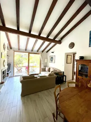 a living room with a couch and a table at Piana in Porto-Vecchio
