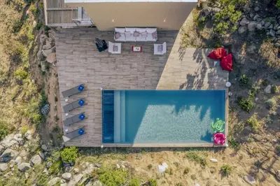 an overhead view of a swimming pool in a house at family villa, beautiful open sea view & scrubland in Conca