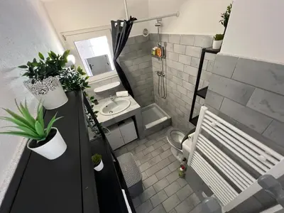 an overhead view of a bathroom with a sink and a shower at Porto Vecchio - Résidence RIVIERA- Villa Lecci in Lecci