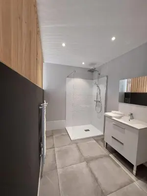 a bathroom with a shower and a toilet and a sink at Rondinara Camara - Lecci Lodge in Lecci
