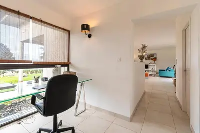 an office with a desk and a chair in a room at Mare e Machja - Maison avec piscine in Cauro