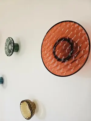 a group of objects on a white wall at Spacieux haut de villa 3 chambres Venaco in Venaco