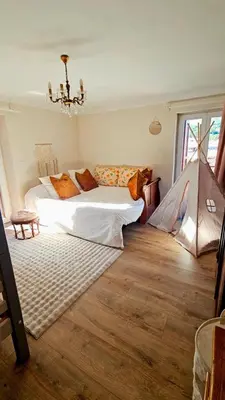 a bedroom with a bed and a tent in it at Splendide T2 Piana in Piana