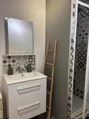 a bathroom with a sink and a mirror at Casa Straboni Corte in Corte