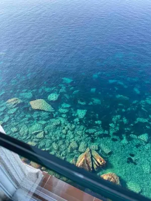 a view of the ocean from the window of an airplane at Penthouse Amazing View in Bonifacio