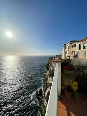 a view of the ocean from the side of a building at Penthouse Amazing View in Bonifacio