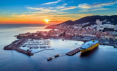 a cruise ship docked in a harbor with a city at Grand T2 Cours Napoléon A in Ajaccio