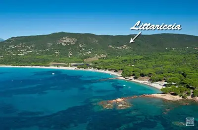 an aerial view of a beach with blue water at Chambres d'Hôtes Littariccia in Porto-Vecchio