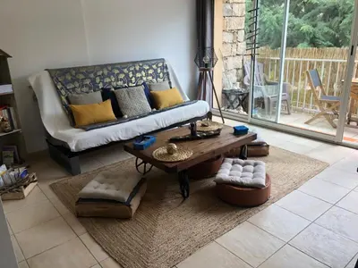 a living room with a couch and a coffee table at Alba rossa in Serra-di-Ferro
