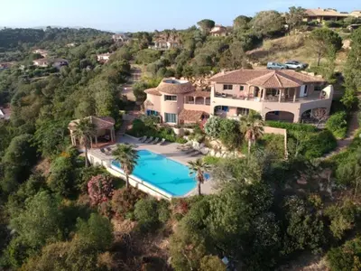 an aerial view of a house with a swimming pool at Villa eden blue F4 3 in Zonza