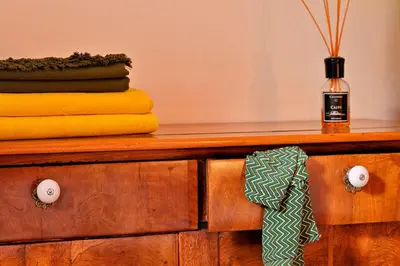 a dresser with a tie on top of it at Les bergeries alivaccia in Figari