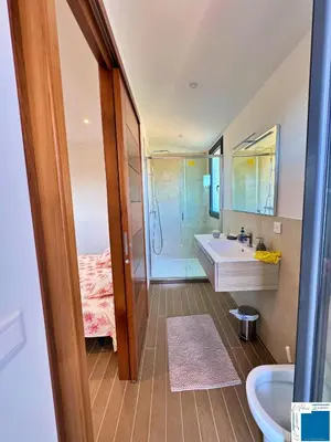 a small bedroom with a bed and a window at VILLA MARINA - 5chb - piscine - plage à pied in Lecci