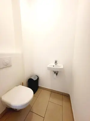 a bathroom with a toilet and a sink at 4-6 couchages vue mer et port de Solenzara Corse in Sari Solenzara