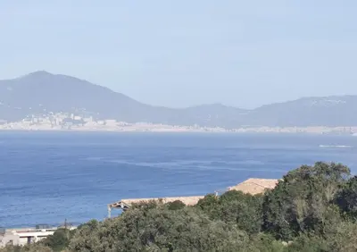 a view of the ocean from the top of a hill at Villa Maquis, Vue mer, élégante maison au calme, 80m2, 4 personnes in Pietrosella