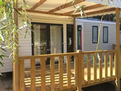 a front porch of a tiny house at Camping Milella in Propriano