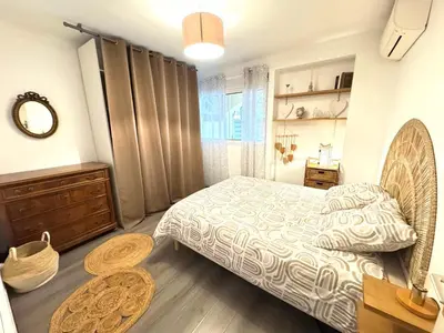 a bedroom with a bed and a dresser and a window at Fiori di sperenza in Coggia