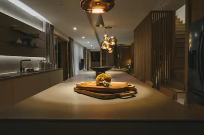 a kitchen with a table with bananas on it at Casi di Mare in Cargèse