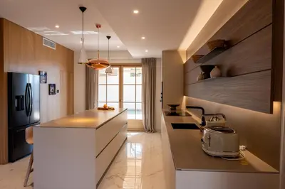 a kitchen with a stove and a counter top at Casi di Mare in Cargèse