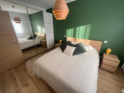 a bedroom with a bed and a large mirror at Casa Culomba in Morta